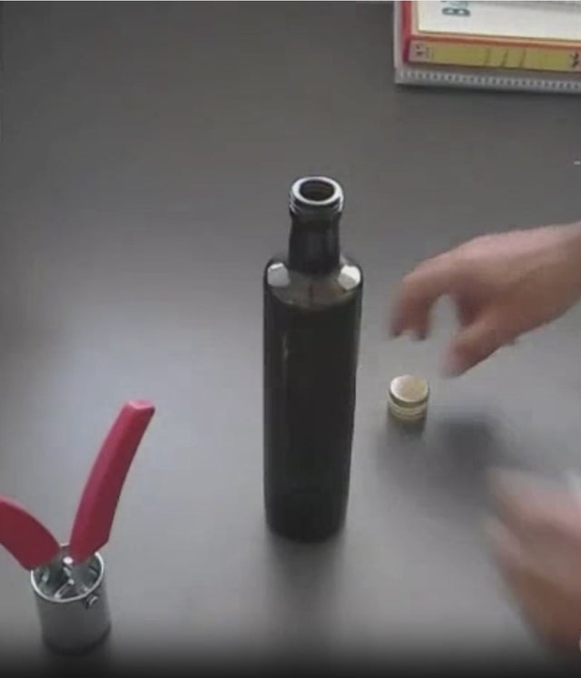 Agrafadora para tapones pilfer